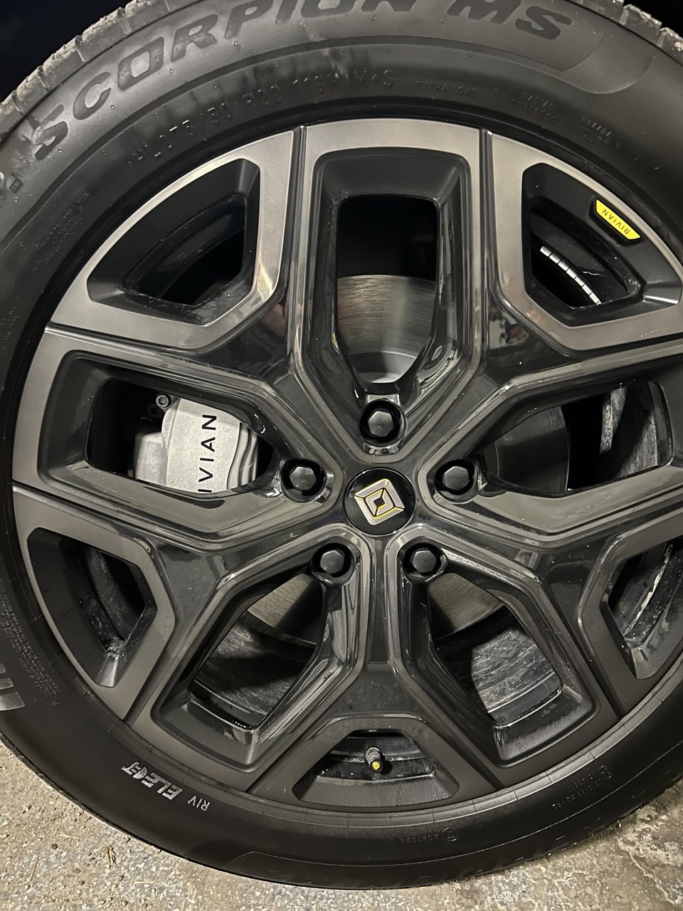 Rivian valve stem caps installed on wheel